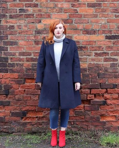 Bold Navy Coat with Red Shoes